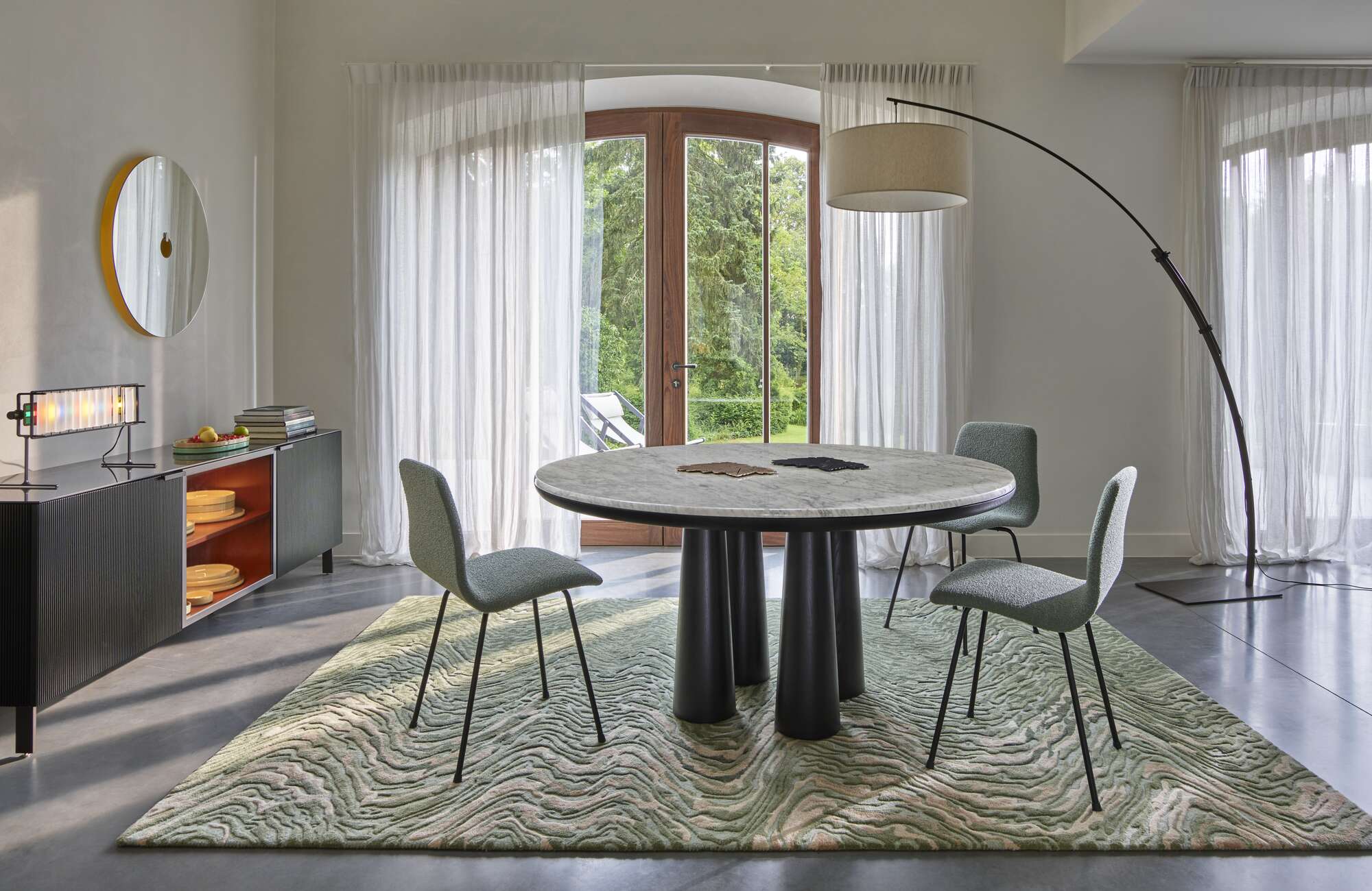 Papyrus Chair upholstered back black lacquered steel base